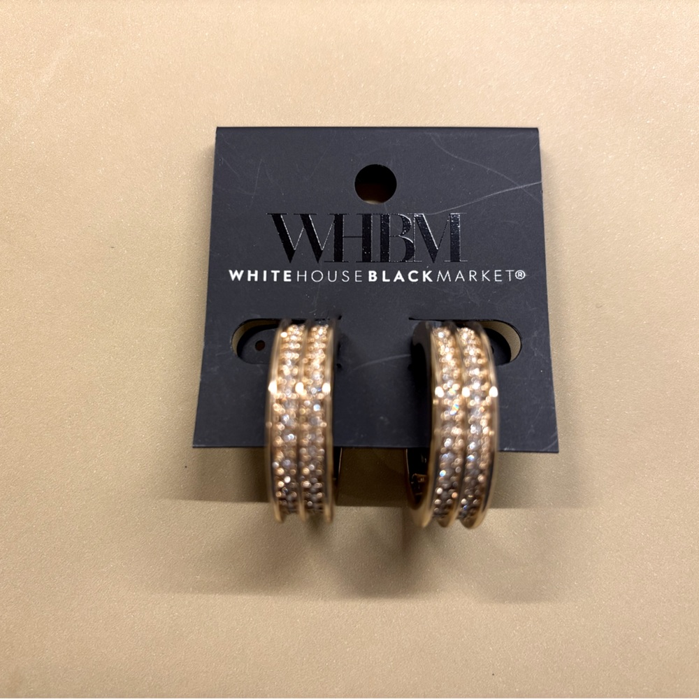 Gold Crystal Grooved Huggie Earrings from White House Black Market.